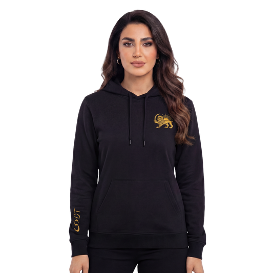Woman wearing a black hoodie with a gold lion emblem and Farsi Azadi on sleeve on a white background